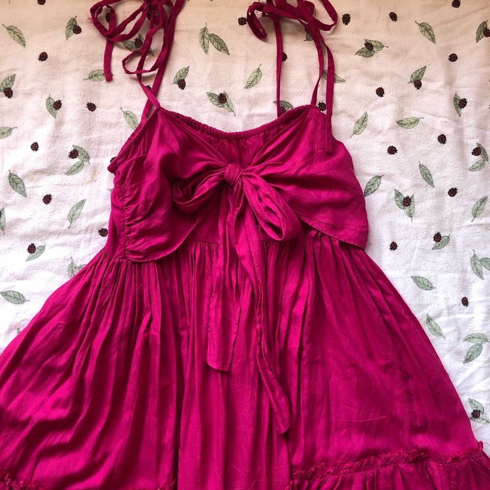 Pink flowy dress with tie front detail